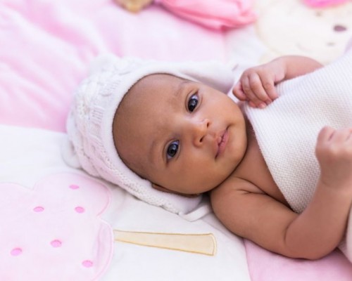 Adorable little african american baby girl looking - Black peopl